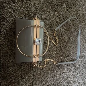 Elegant Gray Clutch with Gold Accents